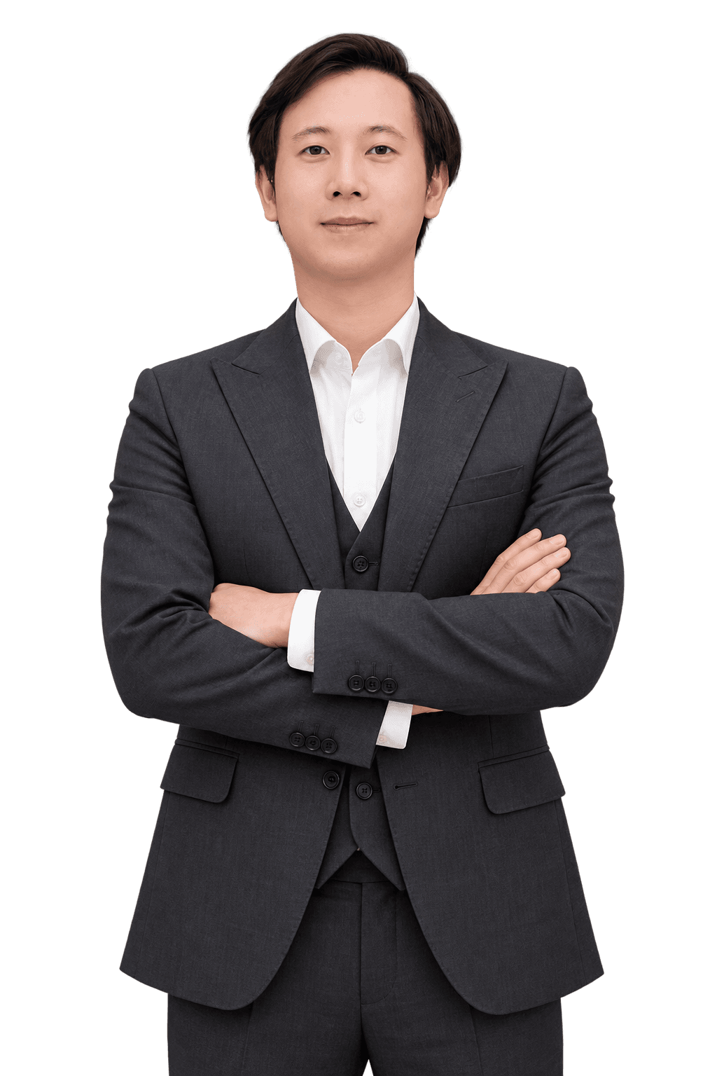 Nguyễn Mạnh Hùng trong trang phục vest, khoanh tay